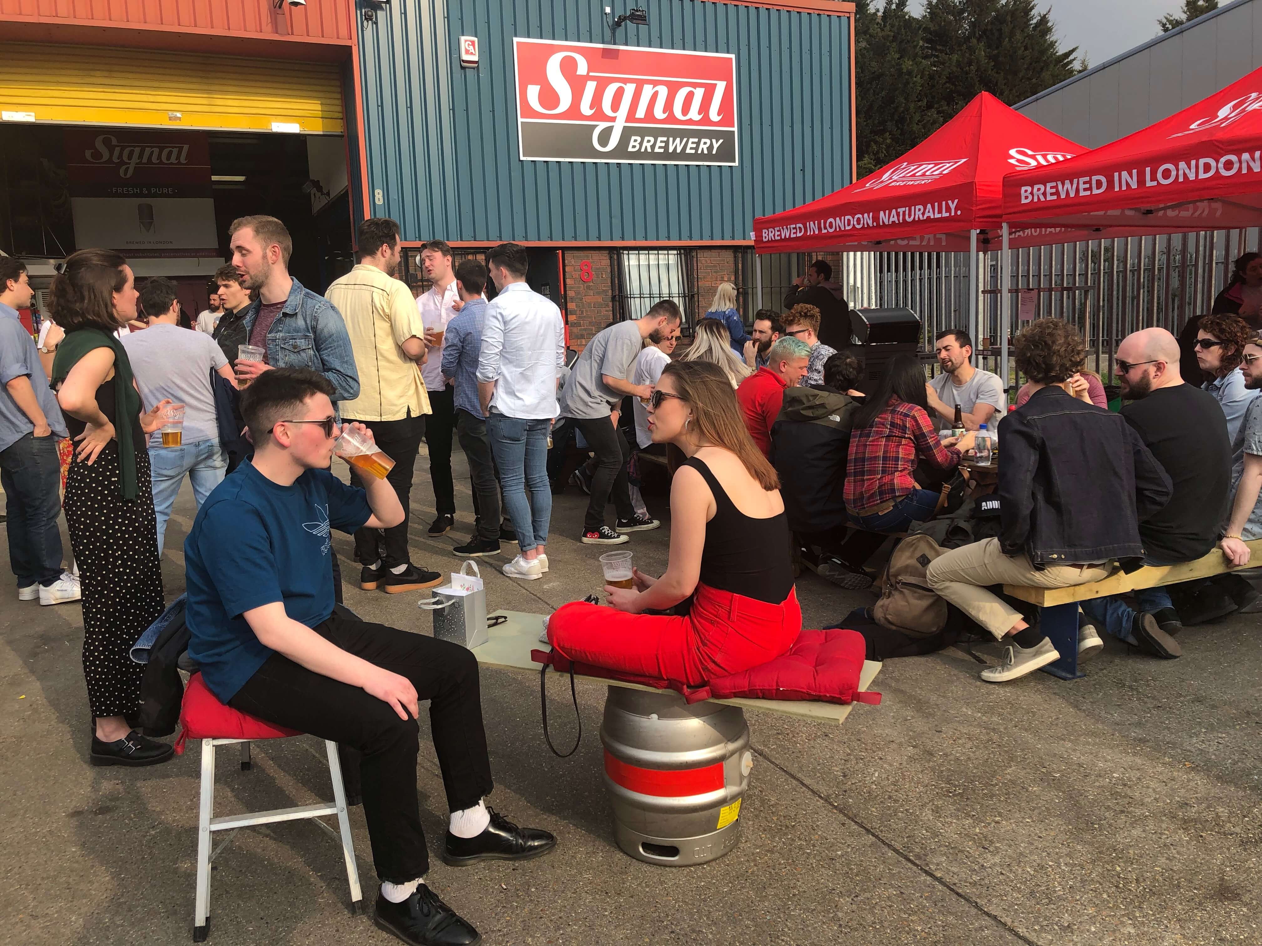 Crowd at Signal Brewery & Taproom, Croydon, South London enjoying beers outside